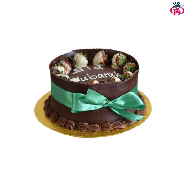 Chocolate flavour cake in green wrapping with white chocolate strawberries arranged on top: Cake Design